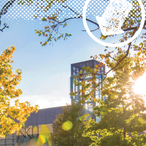 NKU campus at fall with sun reflecting off of the building