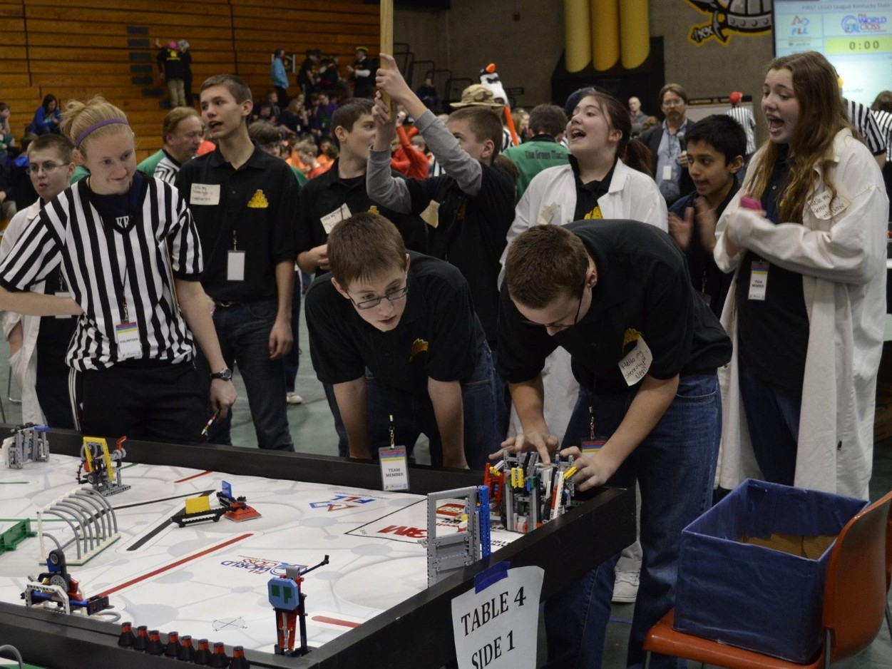 FIRST LEGO League Tournament attendees setting up for the Robot Games