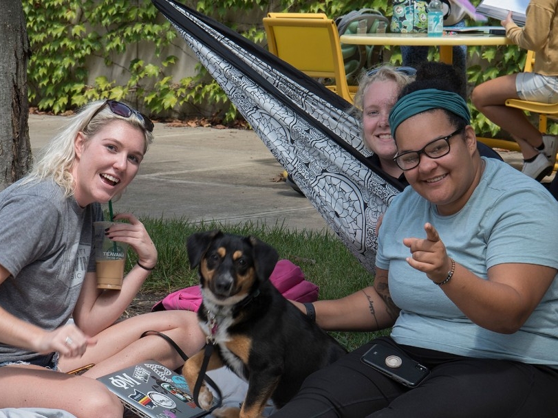 Students having a picnic outdoors on NKU's campus