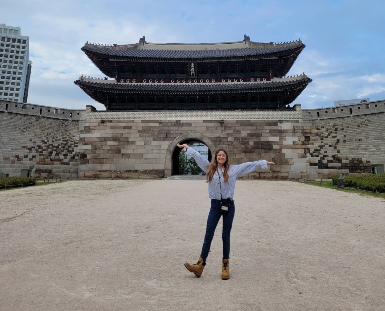 Student in front of Korean-style temple