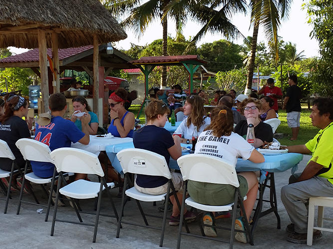 Anthropology students dining together outdoors