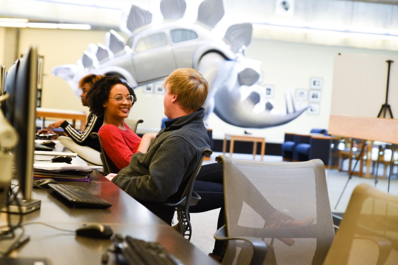 Students talking in Steely Library