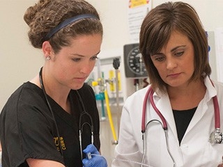 Nursing students in lab setting