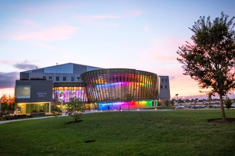 Griffin Hall with sunset behind it