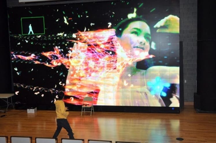 student looking at digitorium screen