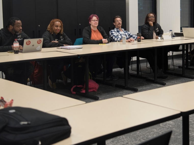 Group of adult students sitting in a classroom